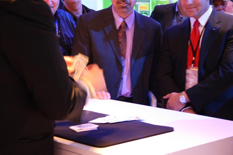 Illustration for article titled Caption This: Magician Bill Malone Deals Ford America Prez Mark Fields From The Bottom Of The Deck